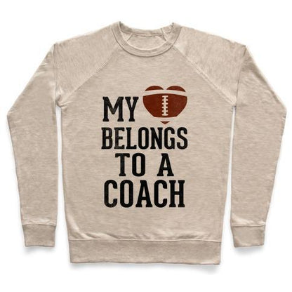 Virgin Teez  Pullover Crewneck Sweatshirt / x-small / Heathered Oatmeal MY HEART BELONGS TO A FOOTBALL COACH (BASEBALL TEE) CREWNECK SWEATSHIRT